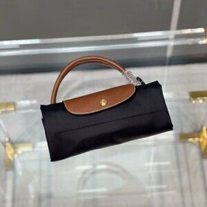 Brand new Longchamp black canvas travel bag
